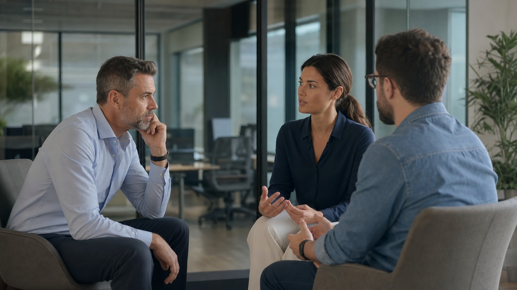 Manager listening during a constructive conversation after a tense meeting